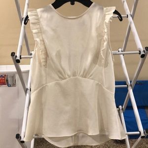 NEW with out tags. Never worn. Express  peplum top- off white ivory color.